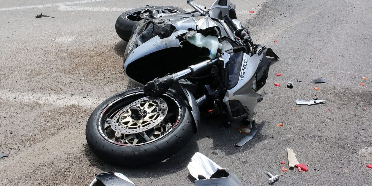 Traffic Accident Between A Car And A Motorcycle