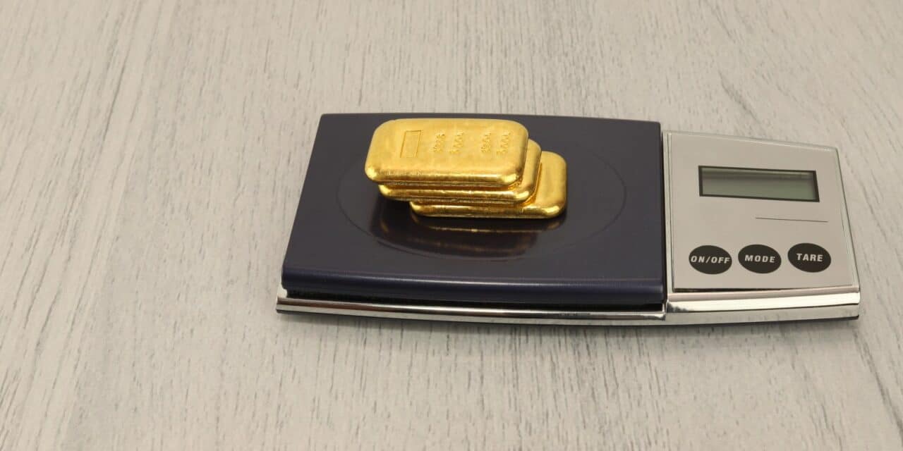 On,The,Electronic,Scales,Are,Gold,Bars.,100,Gram,Ingots,