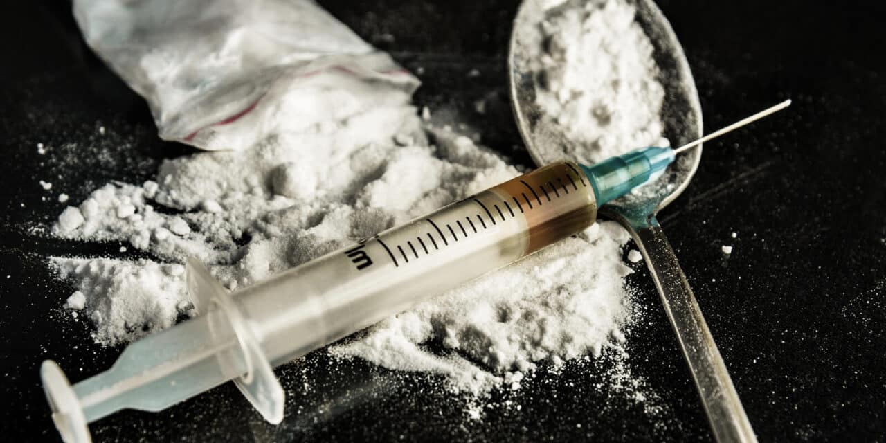 bigstock-Drug-Syringe-And-Cooked-Heroin-76081889