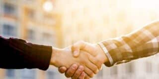 close-up-engineer-architect-shaking-hands_23-2148233786