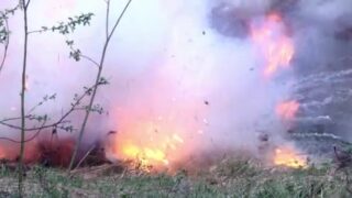 depositphotos_209085162-stock-video-military-hand-grenade-explosion-on