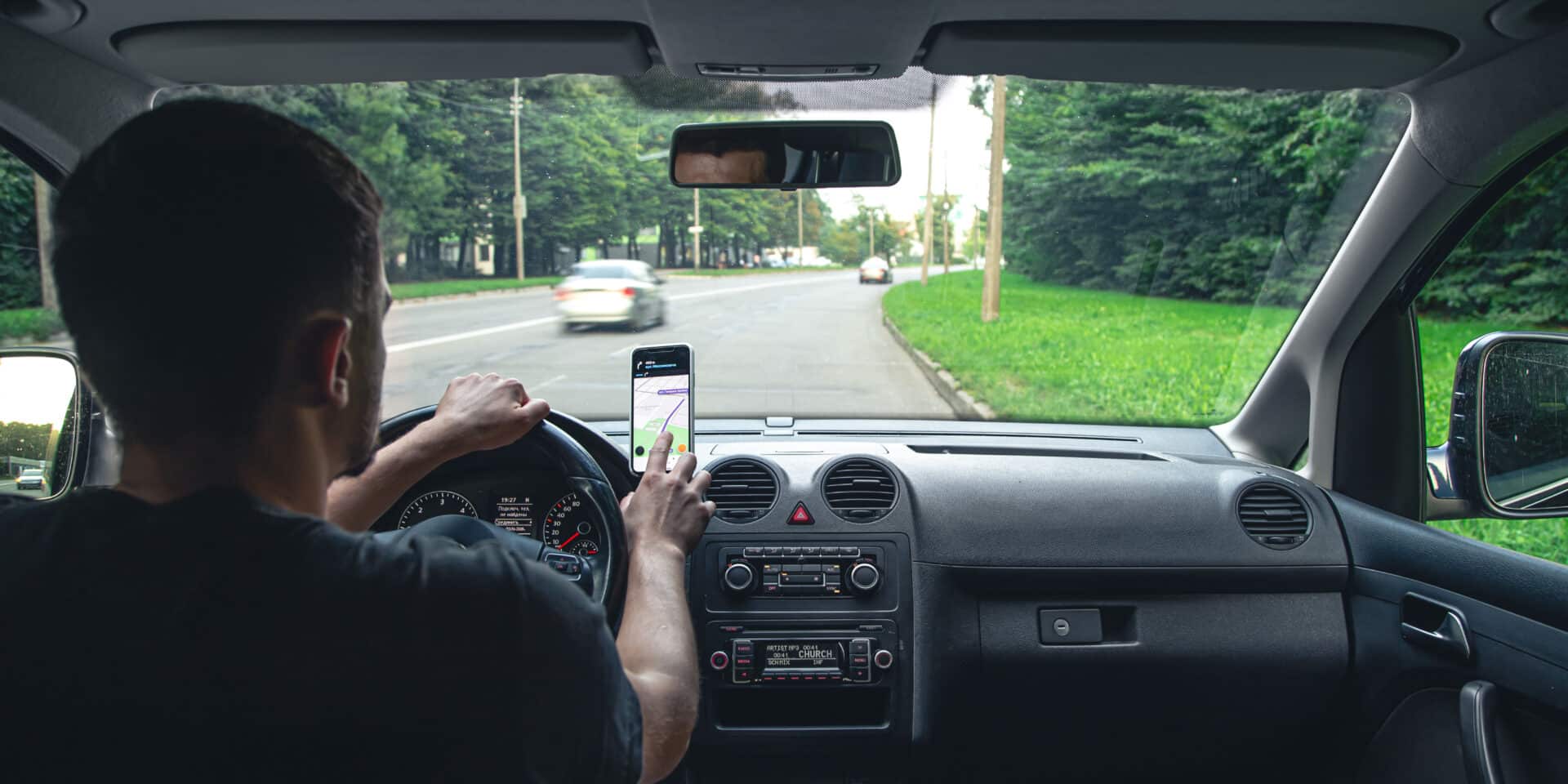 A driver rides through the streets of the city and a navigator.