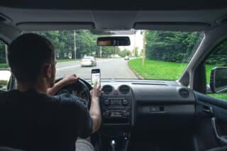 A driver rides through the streets of the city and a navigator.