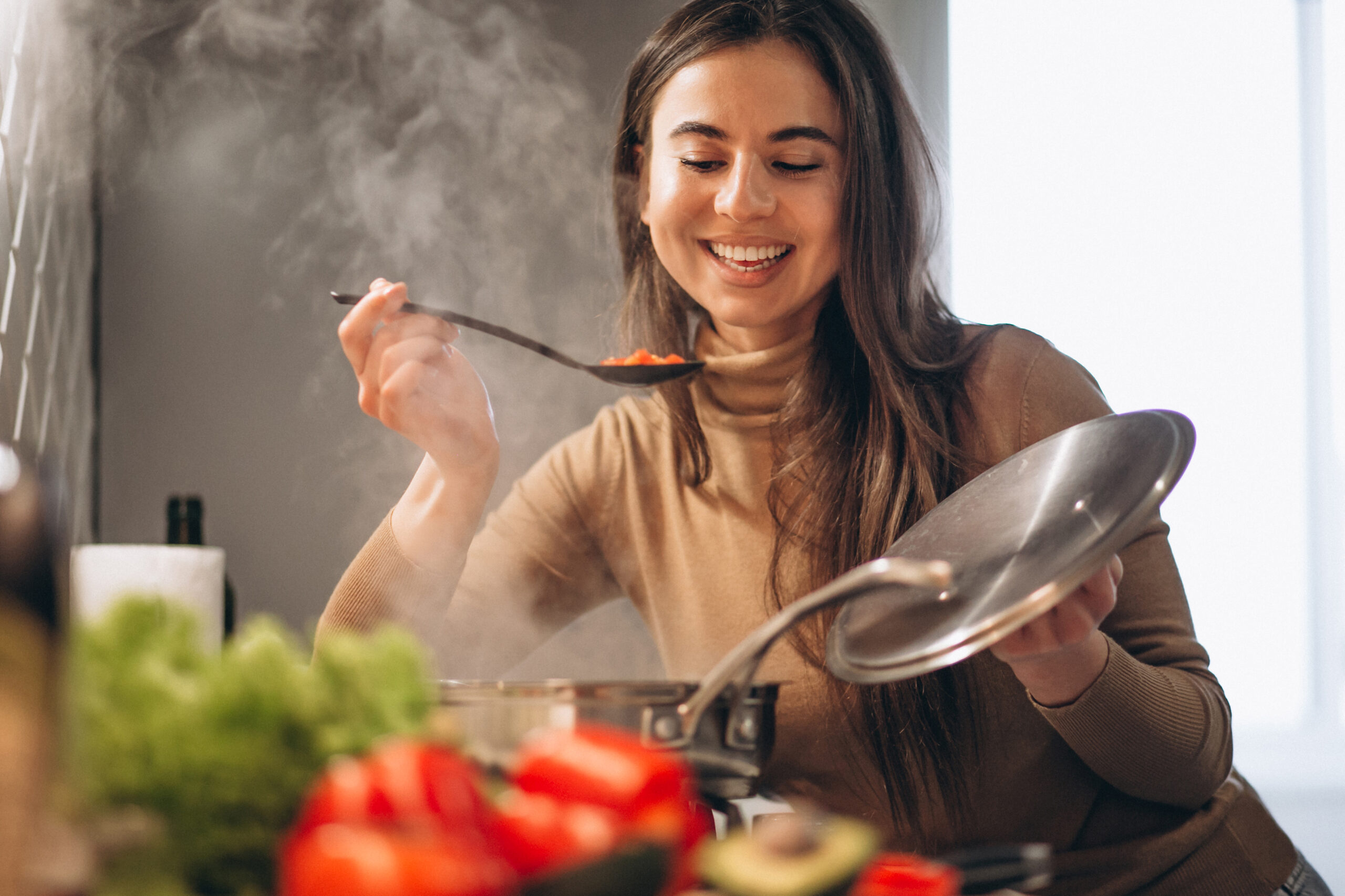 Woman cooking at kitchen