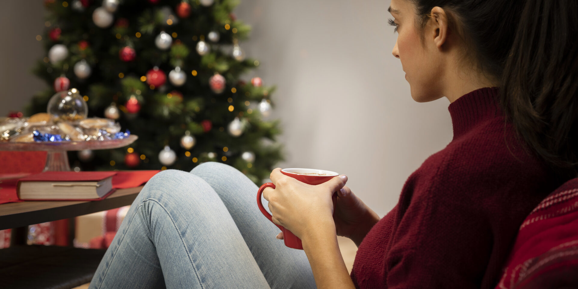 female-looking-cup-with-christmas-background