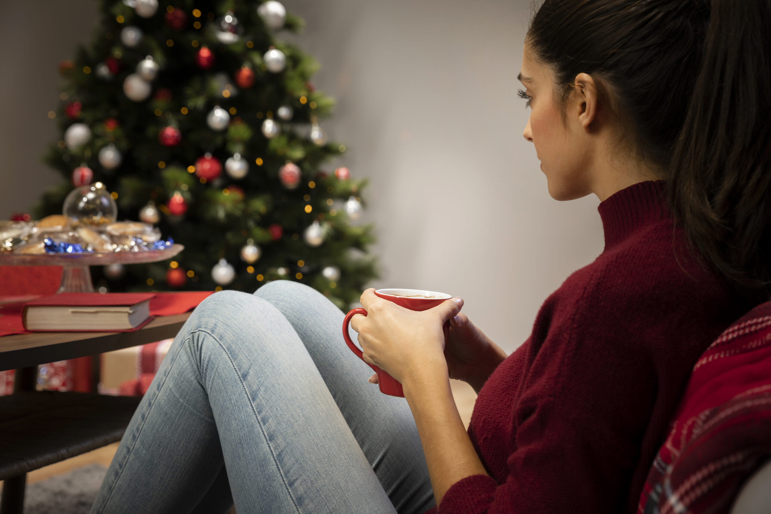 female-looking-cup-with-christmas-background