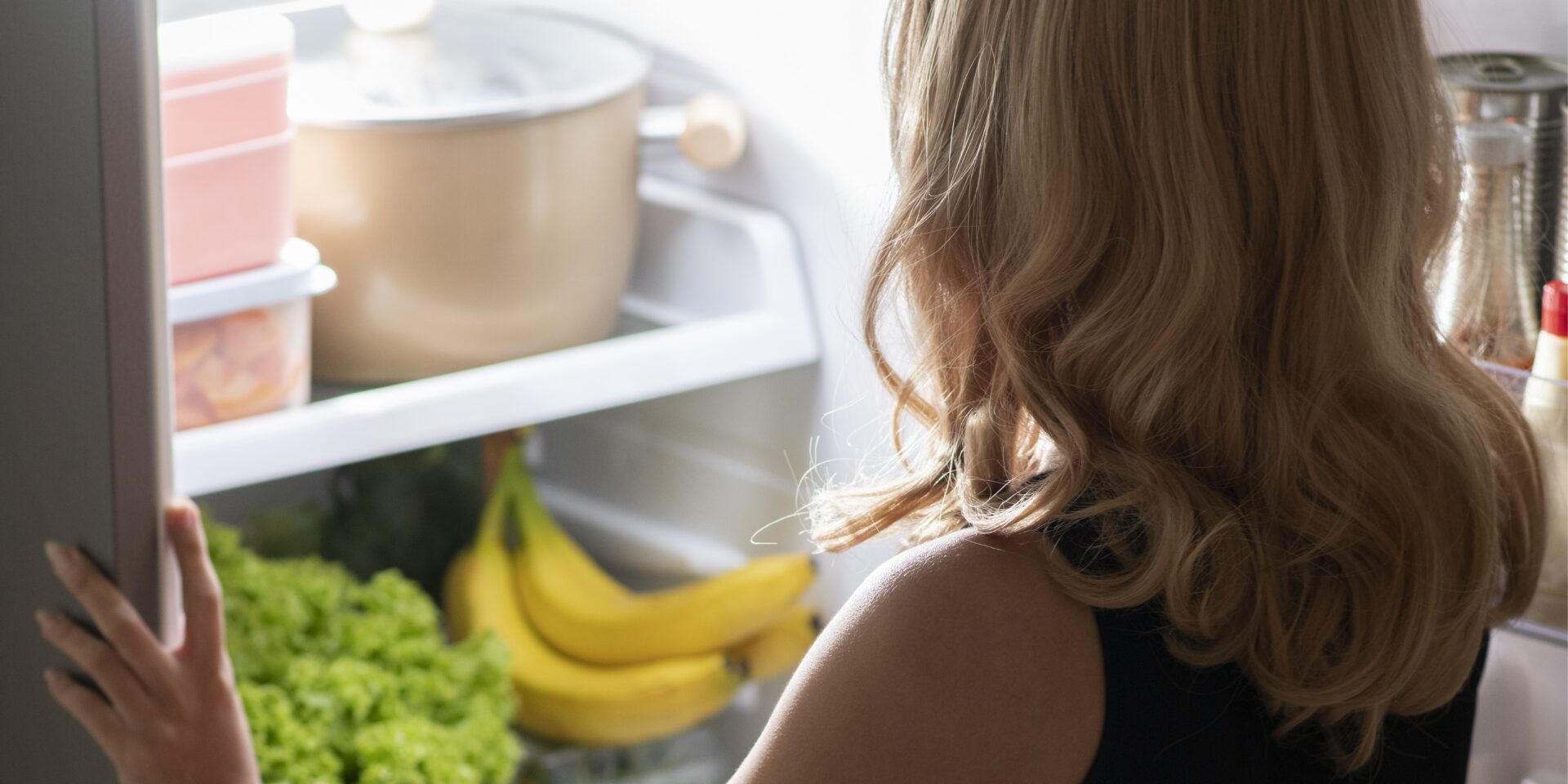 full-shot-skinny-woman-checking-fridge
