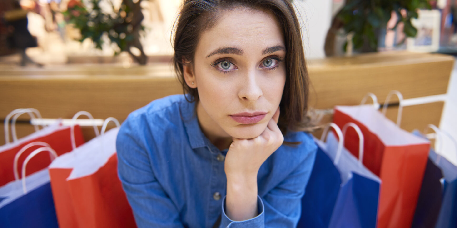 Worried woman spent all her money during shopping