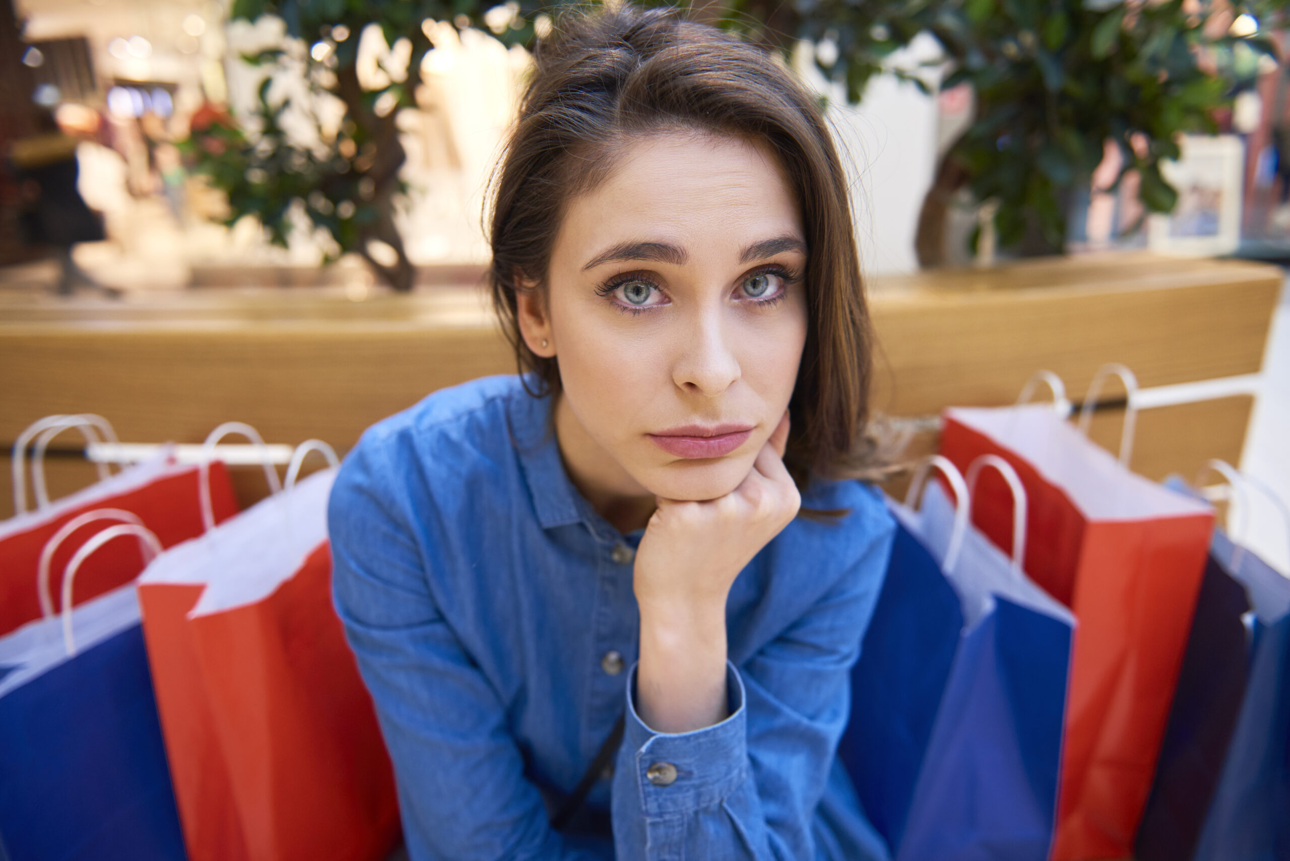 Worried woman spent all her money during shopping