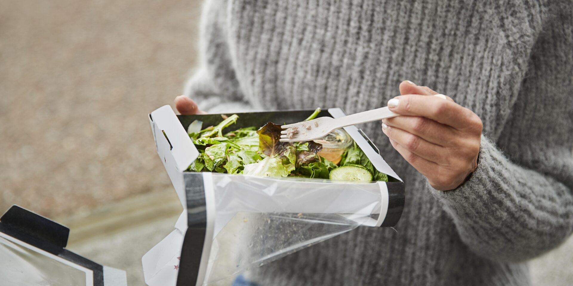 close-up-hand-holding-fork