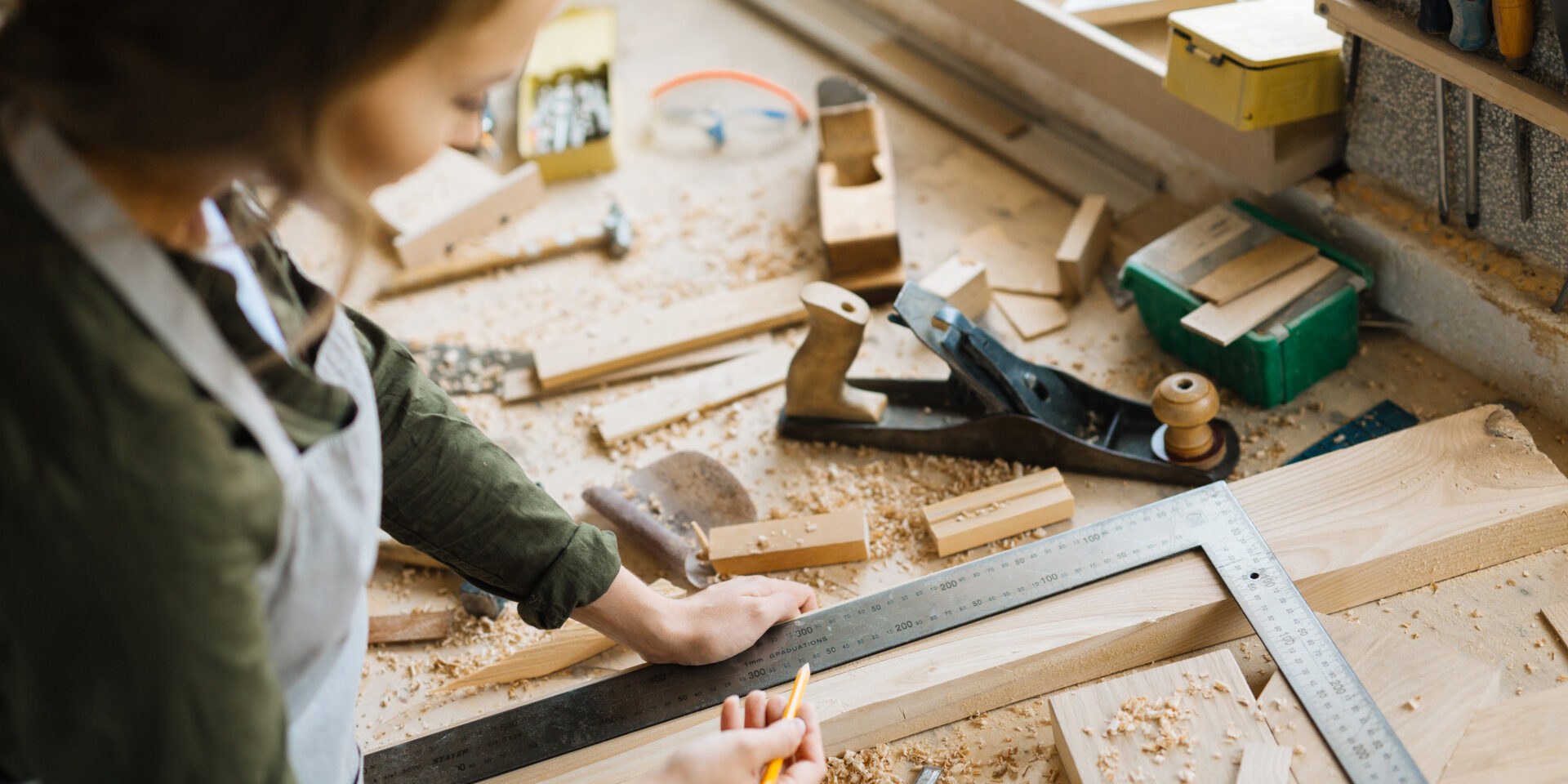 Confident craftswoman wrapped up in work