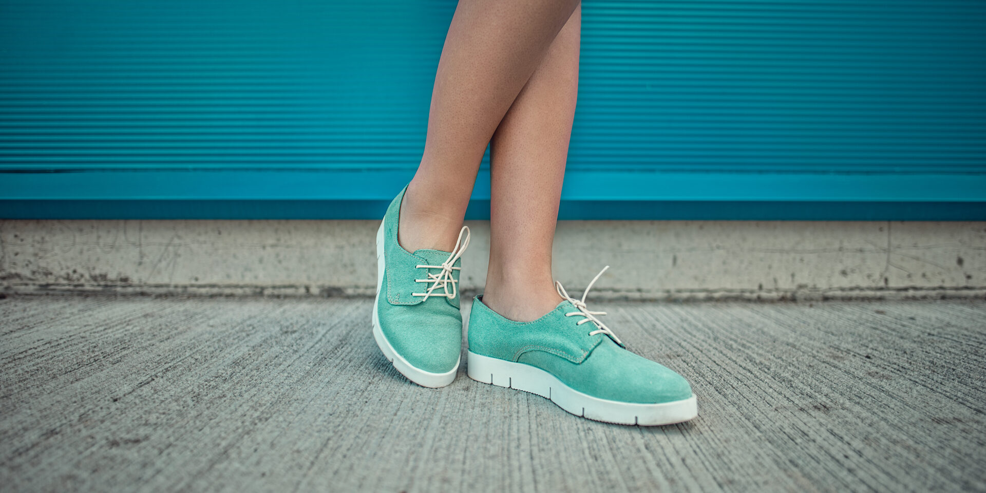 Girl wearing trendy shoes. Shoes close up shoot for fashion stor