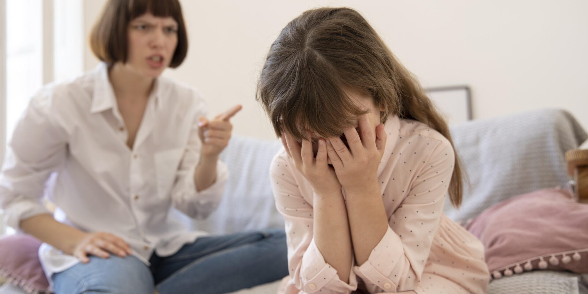 medium-shot-upset-mother-scolding-daughter
