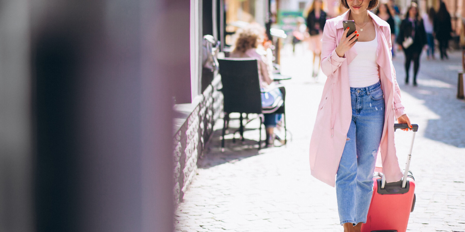 Woman with phone travelling