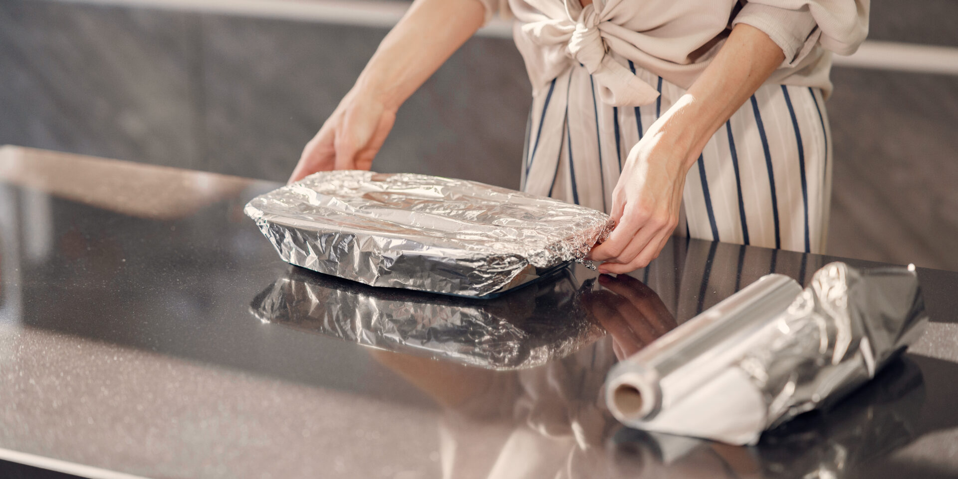 Woman make a dinner in the kitchen at home