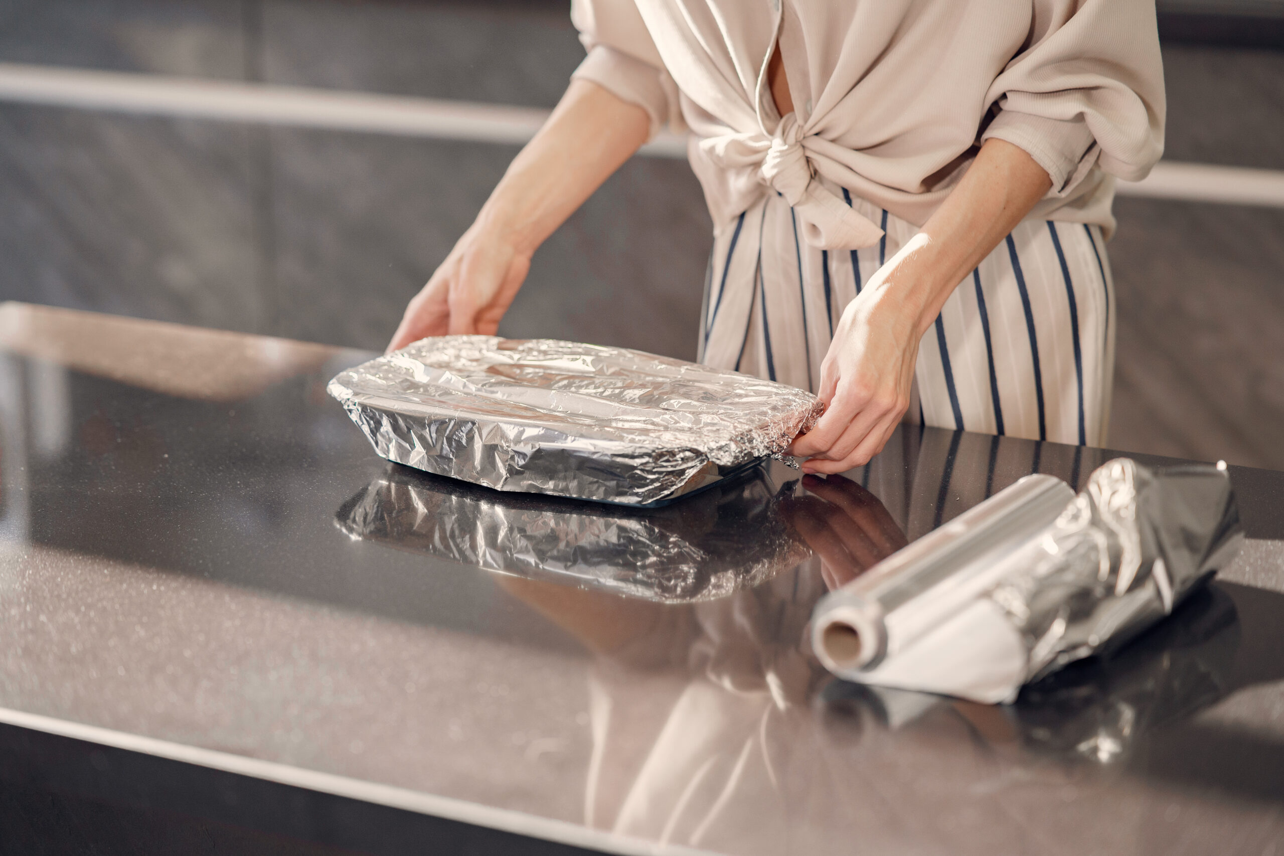 Woman make a dinner in the kitchen at home